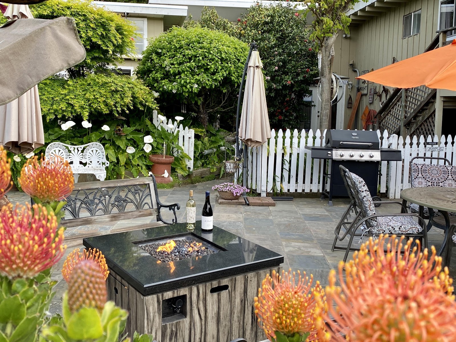 Please feel free to use this peaceful patio during your stay. It is located just outside our office and has BBQs, comfy patio furniture, and a fire pit.