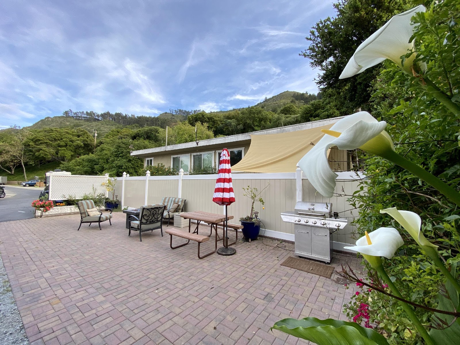 Our deluxe site has a private patio, and outdoor lounge area.